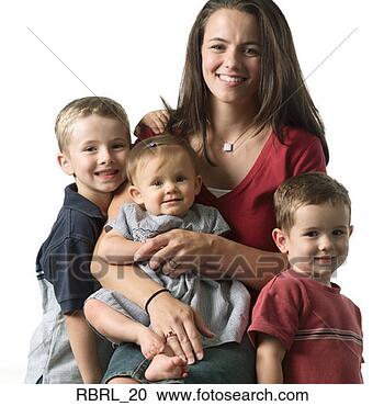 Stock Photography - a caucasian mother 
smiles as she 
sits with her 
sons and new daughter. 
fotosearch - search 
stock photos, 
pictures, images, 
and photo clipart