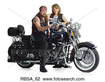 Stock Photo - middle aged adult 
caucasian male 
motorcycle middle 
aged adult blonde. 
fotosearch - search 
stock photos, 
pictures, images, 
and photo clipart