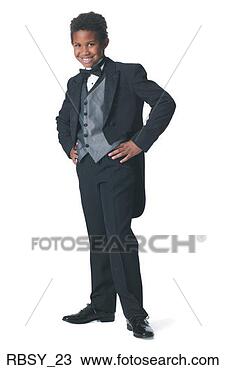 Stock Photo - an african american 
boy dressed in 
a tuxedo puts 
his hands on his. 
fotosearch - search 
stock photos, 
pictures, images, 
and photo clipart