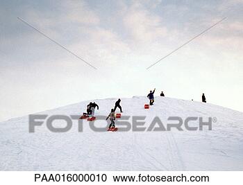 Stock Photography - sweden, sledders 
walking up hill. 
fotosearch - search 
stock photos, 
pictures, images, 
and photo clipart