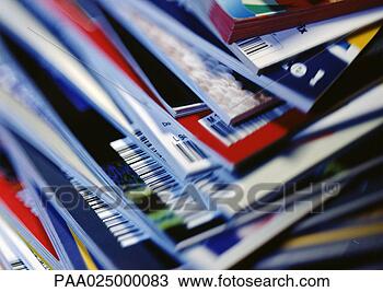 Stock Photo - disorderly stack 
of magazines, 
 extreme close-up 
on corners with. 
fotosearch - search 
stock photos, 
pictures, images, 
and photo clipart