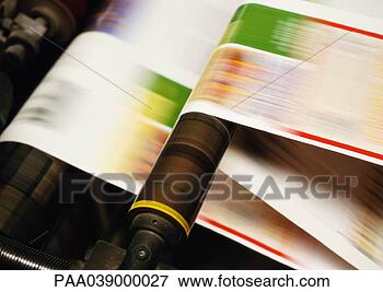 Picture - paper on printing 
press, close up, 
blurred motion. 
fotosearch - search 
stock photos, 
pictures, images, 
and photo clipart