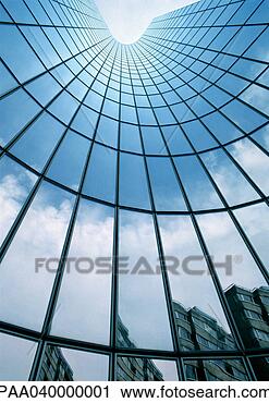 Stock Photography - building reflected 
in skyscraper's 
facade, low angle 
view. fotosearch 
- search stock 
photos, pictures, 
images, and photo 
clipart