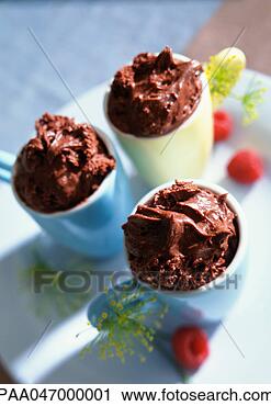 Stock Photography - chocolate mousse 
in small cups, 
close-up. fotosearch 
- search stock 
photos, pictures, 
images, and photo 
clipart
