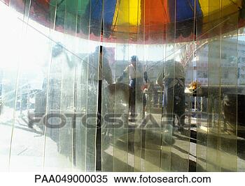Stock Image - china,  xinjiang, 
 urumqi,  plastic 
curtain,  people 
wearing aprons. 
fotosearch - search 
stock photos, 
pictures, images, 
and photo clipart