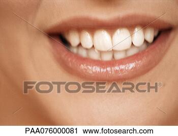 Stock Photography - lower section 
of woman's face, 
toothy smile, 
extreme close-up. 
fotosearch - search 
stock photos, 
pictures, images, 
and photo clipart