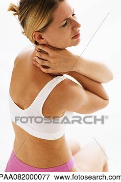 Picture - woman in underwear 
holding neck, 
waist up. fotosearch 
- search stock 
photos, pictures, 
images, and photo 
clipart