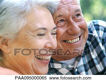 Stock Image - mature man and 
woman smiling, 
close-up. fotosearch 
- search stock 
photos, pictures, 
images, and photo 
clipart