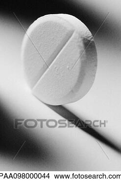 Stock Photo - medicine tablet, 
close-up, b&w. 
fotosearch - search 
stock photos, 
pictures, images, 
and photo clipart