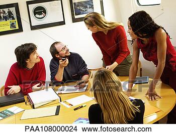 Stock Photo - people in conference 
room, gathered 
around table. 
fotosearch - search 
stock photos, 
pictures, images, 
and photo clipart
