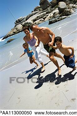 Stock Photography - family running 
together hand-in-hand 
on the beach. 
fotosearch - search 
stock photos, 
pictures, images, 
and photo clipart