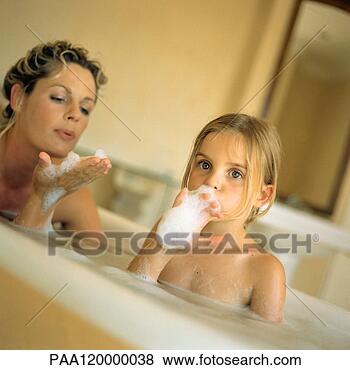 Stock Photo - woman and girl 
in bubble bath. 
fotosearch - search 
stock photos, 
pictures, images, 
and photo clipart