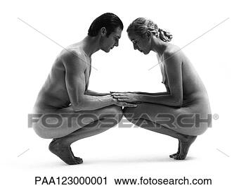Stock Photography - nude man and woman 
crouching face 
to face, b&w. 
fotosearch - search 
stock photos, 
pictures, images, 
and photo clipart