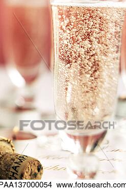 Stock Photo - glass of champagne, 
close-up. fotosearch 
- search stock 
photos, pictures, 
wall murals, images, 
and photo clipart