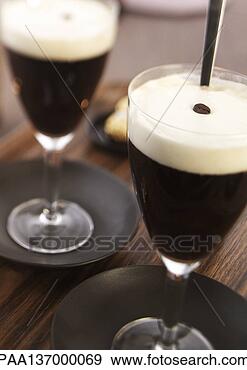 Stock Photograph - two glasses of 
irish coffee. 
fotosearch - search 
stock photos, 
pictures, images, 
and photo clipart