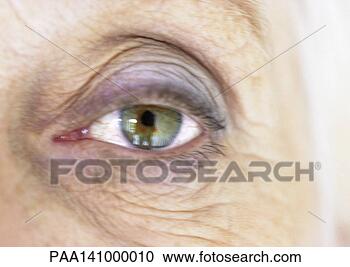 Stock Photography - senior woman's 
eye, close-up. 
fotosearch - search 
stock photos, 
pictures, images, 
and photo clipart