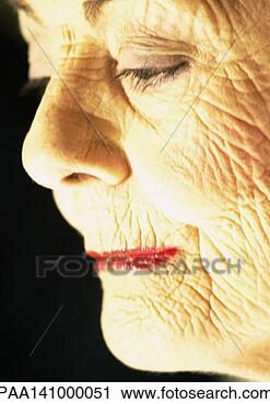 Stock Photography - senior woman, 
side view, close-up. 
fotosearch - search 
stock photos, 
pictures, images, 
and photo clipart