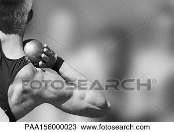 Stock Photo - male athlete preparing 
to throw shot 
put, rear view, 
b&w. fotosearch 
- search stock 
photos, pictures, 
images, and photo 
clipart