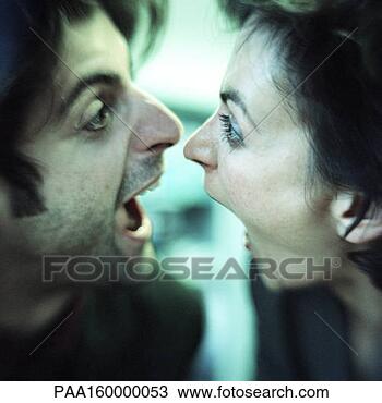 Stock Photo - man and woman 
face to face, 
both screaming, 
close-up. fotosearch 
- search stock 
photos, pictures, 
images, and photo 
clipart