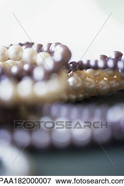 Picture - pearl jewelry, 
close-up, blurred. 
fotosearch - search 
stock photos, 
pictures, images, 
and photo clipart