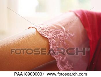 Picture - leg, nightie, 
lace, skin, sensuality, 
softness. fotosearch 
- search stock 
photos, pictures, 
images, and photo 
clipart
