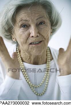 Stock Photo - senior woman, 
portrait. fotosearch 
- search stock 
photos, pictures, 
images, and photo 
clipart