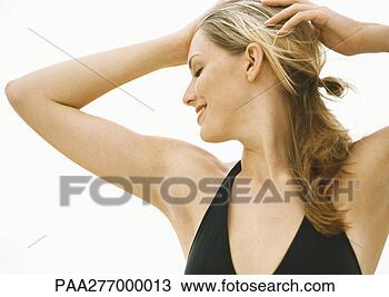 Stock Photo - young woman in 
bathing suit with 
hands on head 
and eyes closed, 
 head. fotosearch 
- search stock 
photos, pictures, 
images, and photo 
clipart