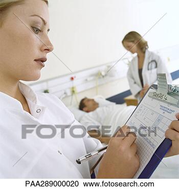 Stock Photography - doctors visiting 
patient. fotosearch 
- search stock 
photos, pictures, 
images, and photo 
clipart