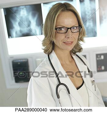 Stock Photography - female doctor 
in x-ray lab. 
fotosearch - search 
stock photos, 
pictures, images, 
and photo clipart