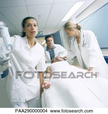 Stock Photo - medical team pushing 
patient on gurney. 
fotosearch - search 
stock photos, 
pictures, images, 
and photo clipart