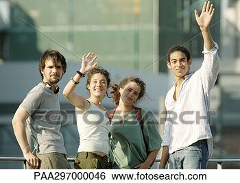 Stock Photo - group of young 
people waving. 
fotosearch - search 
stock photos, 
pictures, images, 
and photo clipart