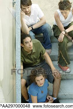 Stock Photo - group of young 
people sitting 
on steps. fotosearch 
- search stock 
photos, pictures, 
images, and photo 
clipart