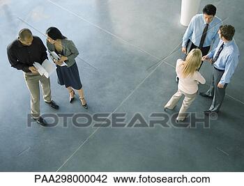 Stock Photo - businesspeople 
in lobby, high 
angle view. fotosearch 
- search stock 
photos, pictures, 
images, and photo 
clipart