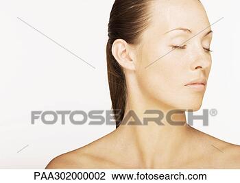 Stock Photo - woman with eyes 
closed and bare 
shoulders. fotosearch 
- search stock 
photos, pictures, 
images, and photo 
clipart