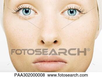 Stock Photo - woman's face, 
extreme close-up. 
fotosearch - search 
stock photos, 
pictures, images, 
and photo clipart