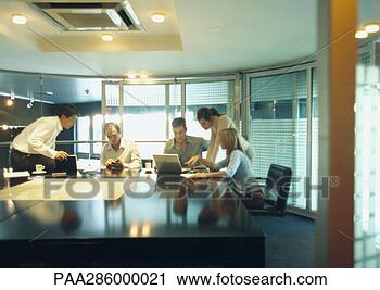 Stock Photography - businesspeople 
working in conference 
room. fotosearch 
- search stock 
photos, pictures, 
images, and photo 
clipart