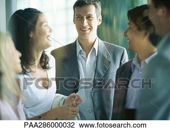 Stock Photo - group of businesspeople 
smiling. fotosearch 
- search stock 
photos, pictures, 
images, and photo 
clipart