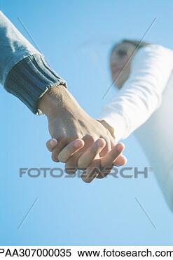 Stock Image - holding hands. 
fotosearch - search 
stock photos, 
pictures, wall 
murals, images, 
and photo clipart