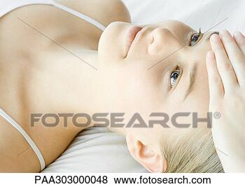 Stock Photo - woman having head 
massage. fotosearch 
- search stock 
photos, pictures, 
images, and photo 
clipart