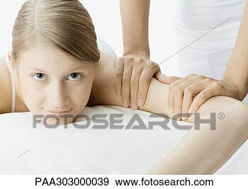 Stock Photograph - woman having massage. 
fotosearch - search 
stock photos, 
pictures, images, 
and photo clipart