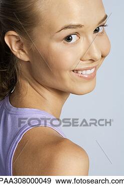Stock Photograph - young, young people, 
woman, females, 
tanktop, grinning, 
face. fotosearch 
- search stock 
photos, pictures, 
images, and photo 
clipart