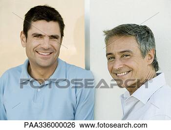 Stock Photo - two men, smiling 
and looking at 
camera, portrait. 
fotosearch - search 
stock photos, 
pictures, images, 
and photo clipart