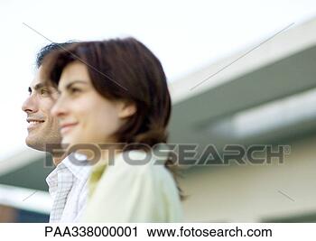 Stock Photography - young couple, 
side view. fotosearch 
- search stock 
photos, pictures, 
images, and photo 
clipart