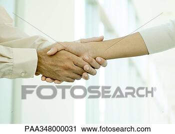 Stock Photography - man clasping woman's 
hand, close-up. 
fotosearch - search 
stock photos, 
pictures, images, 
and photo clipart