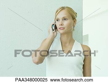 Stock Image - woman using cell 
phone. fotosearch 
- search stock 
photos, pictures, 
images, and photo 
clipart