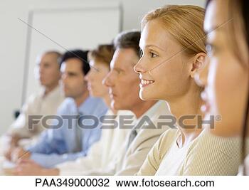 Stock Photo - group of executives 
in meeting, side 
view. fotosearch 
- search stock 
photos, pictures, 
images, and photo 
clipart