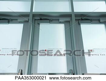 Stock Photography - emergency exit 
doors in airport, 
low angle view. 
fotosearch - search 
stock photos, 
pictures, images, 
and photo clipart