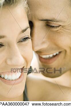 Picture - couple smiling, 
faces close-together. 
fotosearch - search 
stock photos, 
pictures, images, 
and photo clipart