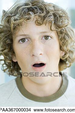 Stock Photo - preteen boy with 
mouth open, portrait. 
fotosearch - search 
stock photos, 
pictures, images, 
and photo clipart