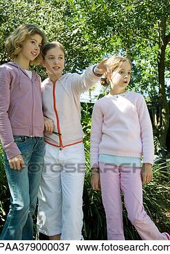 Picture - group of girls, 
one pointing. 
fotosearch - search 
stock photos, 
pictures, images, 
and photo clipart